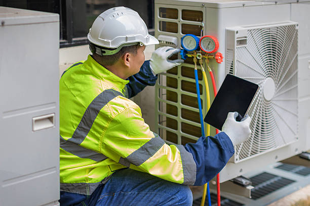 Professional Hvac technician working in Woodville, OH